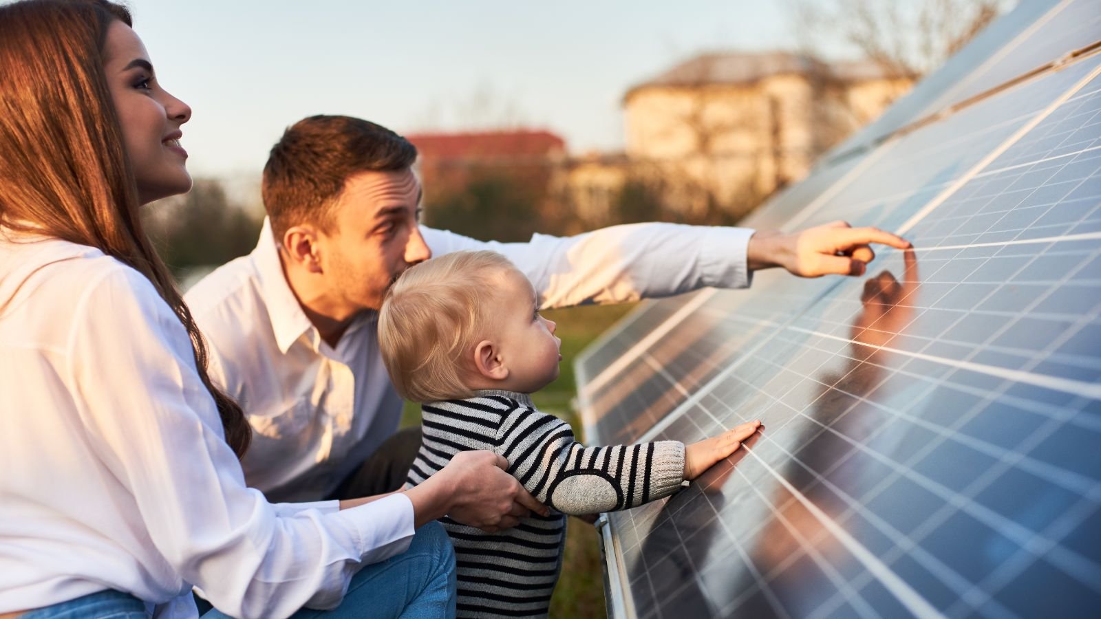 Solar installers working on a residential roof